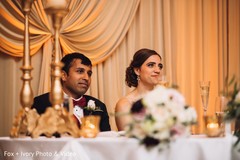 Indian bride and groom during speeches. Indian bride and groom during speeches.