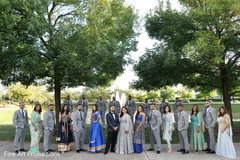 Maharanis and groomsmen posing with the couple. Maharanis and groomsmen posing with the couple.