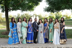 Bridesmaids and the couple outside during pictures. Bridesmaids and the couple outside during pictures.