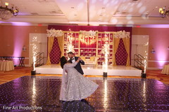 Indian bride and groom having their first dance. Indian bride and groom having their first dance.