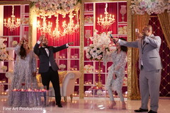 Indian couple with special guests during toasts. Indian couple with special guests during toasts.