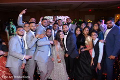 Maharani and Indian groom posing with guests. Maharani and Indian groom posing with guests.