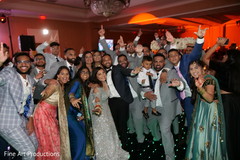 Indian bride and groom with special guests for pictures. Indian bride and groom with special guests for pictures.