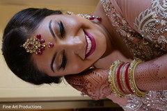 Indian bride wearing the ceremonial tikka. Indian bride wearing the ceremonial tikka.
