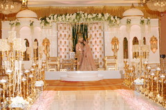 Indian wedding's gold and white decor details. Indian wedding's gold and white decor details.