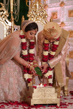 Indian bride and groom during the ceremonial rituals. Indian bride and groom during the ceremonial rituals.