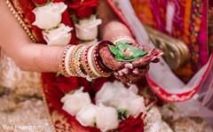 Indian bride holding a leave during her wedding ceremony. Indian bride holding a leave during her wedding ceremony.