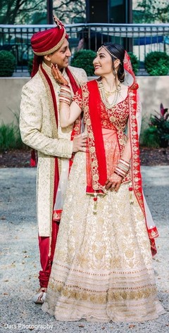 Indian bride and groom looking at each other's eyes. Indian bride and groom looking at each other's eyes.