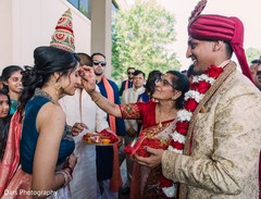 Indian bride and groom at milni ritual. Indian bride and groom at milni ritual.