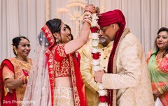 Maharani putting the garland to groom ritual. Maharani putting the garland to groom ritual.