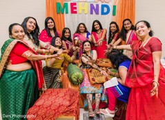 Indian bride and bridesmaids at mehndi party. Indian bride and bridesmaids at mehndi party.