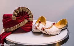 Red and golden turban and white mojaris. Red and golden turban and white mojaris.