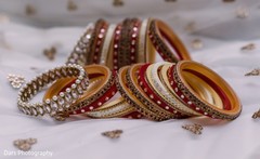 Red white and golden Indian bridal ceremony bangles. Red white and golden Indian bridal ceremony bangles.