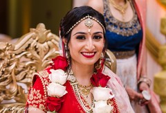Indian bride with her kundan tikka and necklace set. Indian bride with her kundan tikka and necklace set.