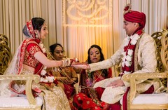 Indian couple during the joint of hands ritual. Indian couple during the joint of hands ritual.