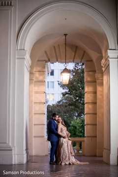 Indian newlywed couple sharing a moment at a balcony Indian newlywed couple sharing a moment at a balcony
