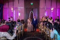 Indian newlyweds entering the reception hall Indian newlyweds entering the reception hall