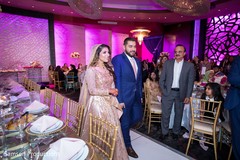 Indian newlywed couple walking to the stage Indian newlywed couple walking to the stage
