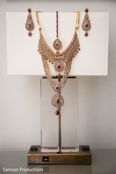 A necklace and an earring pair to be used by the Indian bride A necklace and an earring pair to be used by the Indian bride