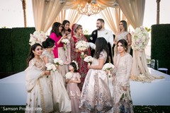Indian newlywed couple and several female Indian relatives Indian newlywed couple and several female Indian relatives