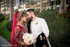 Indian newlyweds sharing a moment outside the venues Indian newlyweds sharing a moment outside the venues
