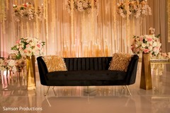 The couch on a stage decorated with flowers The couch on a stage decorated with flowers