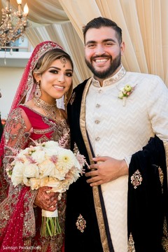 Indian newlyweds posing on stage Indian newlyweds posing on stage