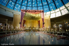 Pink floral and draped mandap. Pink floral and draped mandap.