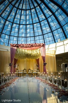 Floral mandap under a crystal dome. Floral mandap under a crystal dome.