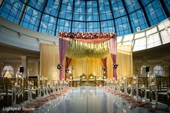 Hindu wedding ceremony mandap with hanging flowers. Hindu wedding ceremony mandap with hanging flowers.