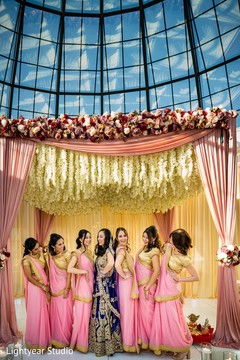 Indian bridesmaids in pink sarees. Indian bridesmaids in pink sarees.