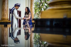 Indian couple admiring each other's outfits. Indian couple admiring each other's outfits.