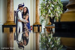Indian bride and groom in blue and white outifits. Indian bride and groom in blue and white outifits.