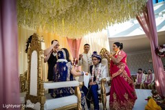 Indian lovebirds being tied by a cord. Indian lovebirds being tied by a cord.