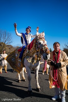 Indian groom riding his white baraat horse. Indian groom riding his white baraat horse.