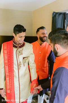 Indian groom and Indian relatives on the preparation room Indian groom and Indian relatives on the preparation room