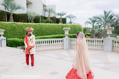 Indian groom taking a look at his Maharani. Indian groom taking a look at his Maharani.