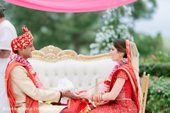 Indian couple tied with a red thread. Indian couple tied with a red thread.