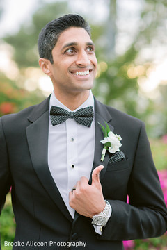 Indian groom posing with his tux. Indian groom posing with his tux.