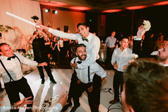 Indian groom having fun in the reception party. Indian groom having fun in the reception party.