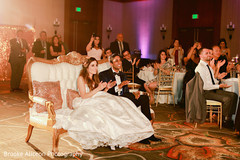 Indian couple watching the reception performance. Indian couple watching the reception performance.