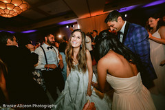 Maharani and Indian groomsman having a good time during the reception. Maharani and Indian groomsman having a good time during the reception.