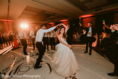 Indian bride and Indian groom showing dance moves. Indian bride and Indian groom showing dance moves.