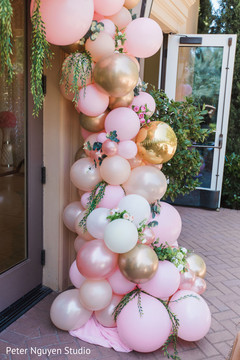 Golden, white, pink and pearly balloons door decoration. Golden, white, pink and pearly balloons door decoration.