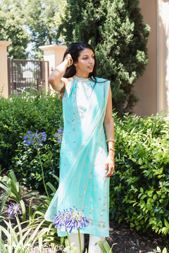 Maharani on her Georgette Straight Suit in aqua color. Maharani on her Georgette Straight Suit in aqua color.