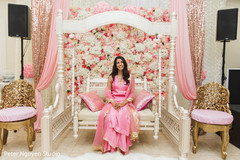 Maharani sitting on hwe white pre-wedding swing seat. Maharani sitting on hwe white pre-wedding swing seat.