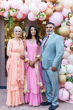 Indian bride posing with her parents. Indian bride posing with her parents.
