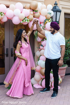 Indian couple first look at pre-wedding celebration. Indian couple first look at pre-wedding celebration.