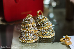 Yellow gold, pearls and diamonds bangles with hanging bells. Yellow gold, pearls and diamonds bangles with hanging bells.