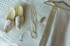 Indian grooms wedding ceremony shoes, jewelry and shawl. Indian grooms wedding ceremony shoes, jewelry and shawl.